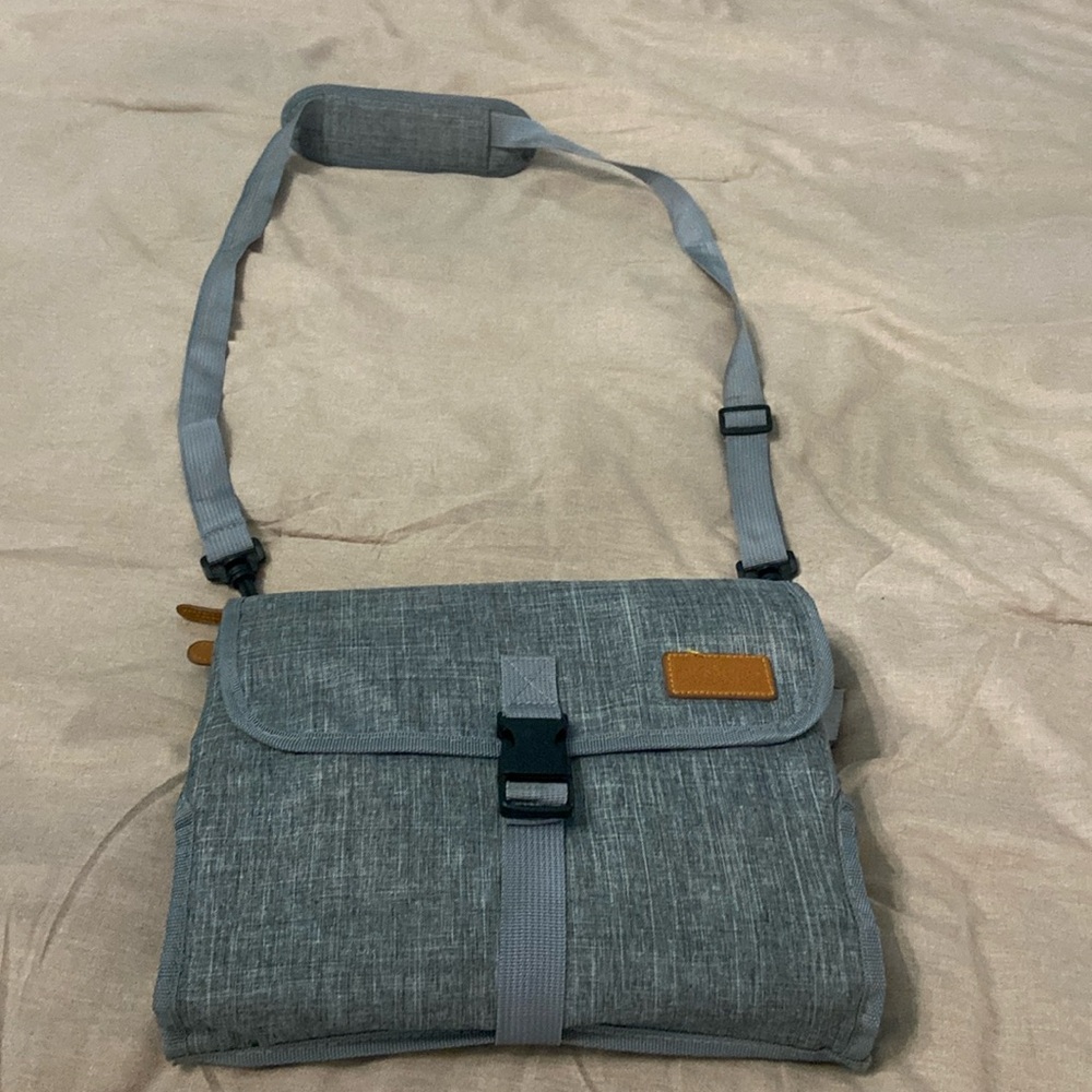 Portable diaper bag/changing pad